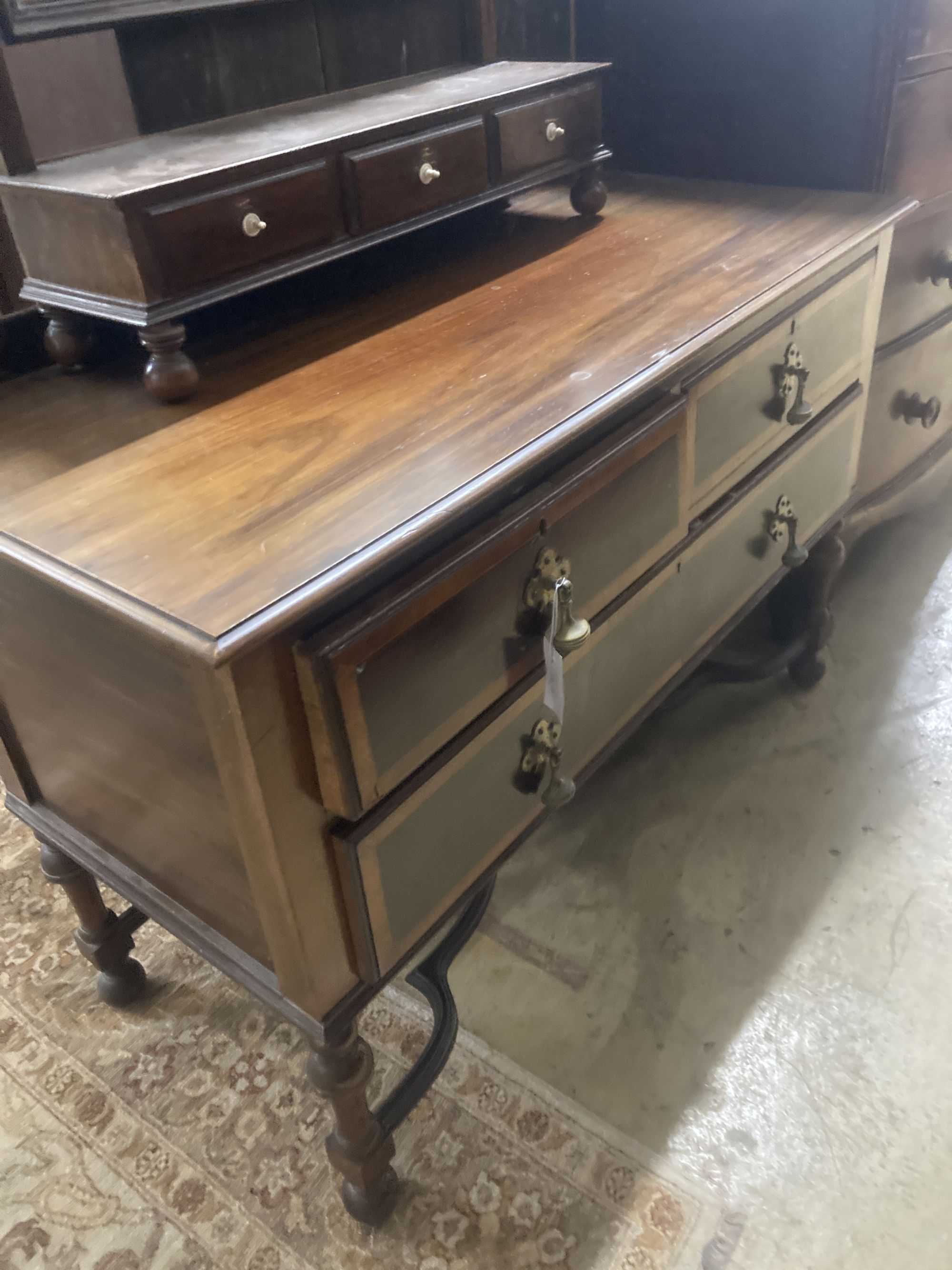 A William and Mary style banded mahogany chest, fitted over with a later mirror, width 114cm, depth 52cm, height 160cm